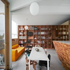 Wooden Bookshelf On White Wall View White Table - Karbonix