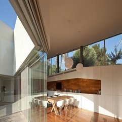 Wooden Table Dining Room Inside Glazed Wall White Chairs - Karbonix