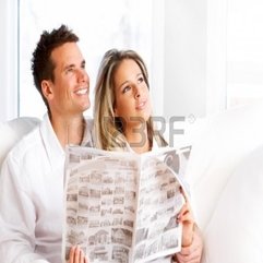 Best Inspirations : Young Love Couple Reading Magazine In The Comfortable Apartment - Karbonix